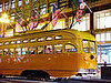 A refurbished vintage streetcar from Milan runs past Old Navy on Market St, downtown
