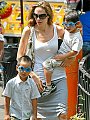 Nice shades! Angelina Jolie takes kids Maddox, 6, Pax, 3, and Zahara, 2 (not pictured), for a carousel ride in Central Park Satu