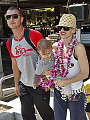 After covering up for a concert in Malaysia, Gwen Stefani – with husband Gavin Rosdale and son Kingston, 14 months – takes her t