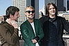 Daniel (centre) and members of fellow Australian band Powderfinger.