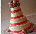 this would be a great wedding shower cake . i love the ribbon that wraps around it !