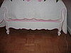 Footboard of the bed had classic french styling with the scallops.  I painted pink on the edges to match the quilts.