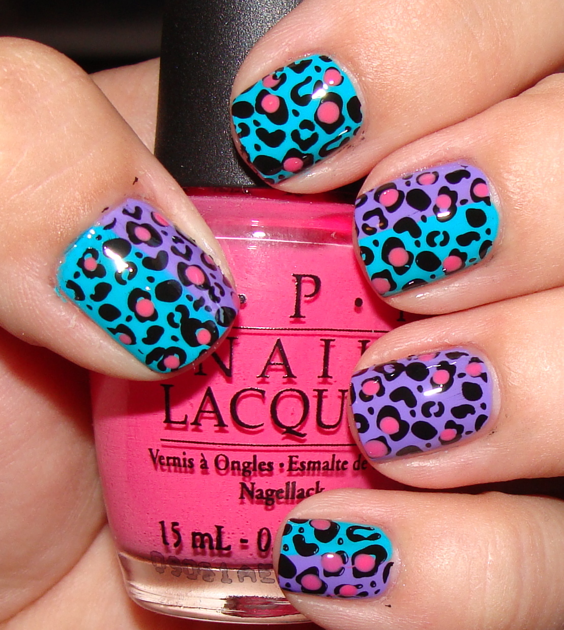 Bright Purple, Teal and Pink 80s Leopard Nail Art. 